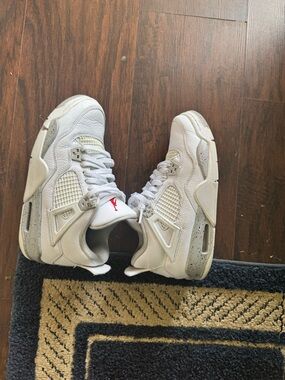 Jordan 4 Retro. White. 7Y/ Women 8.5